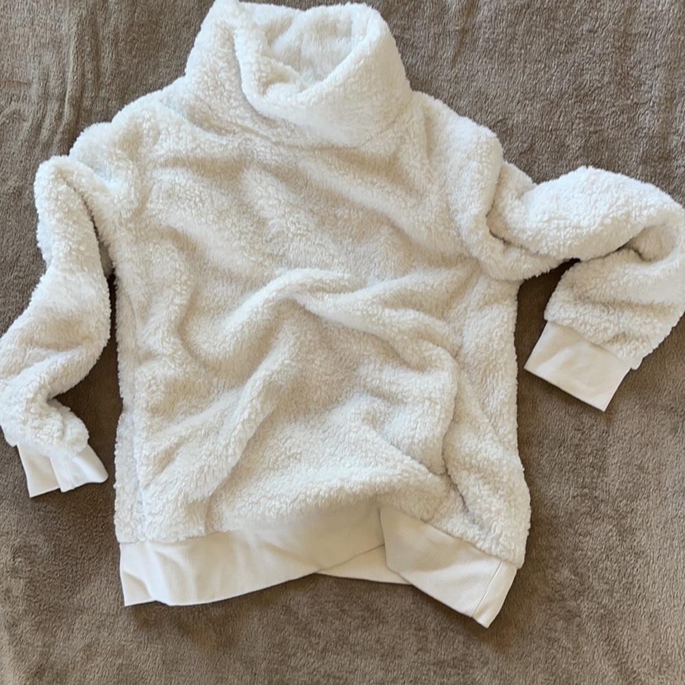 Plush ivory pullover with pockets